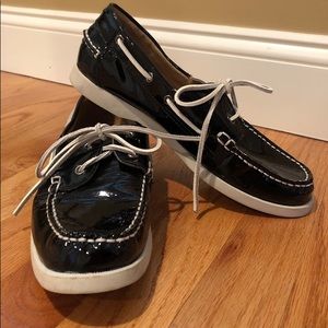 Black patent leather boat shoes